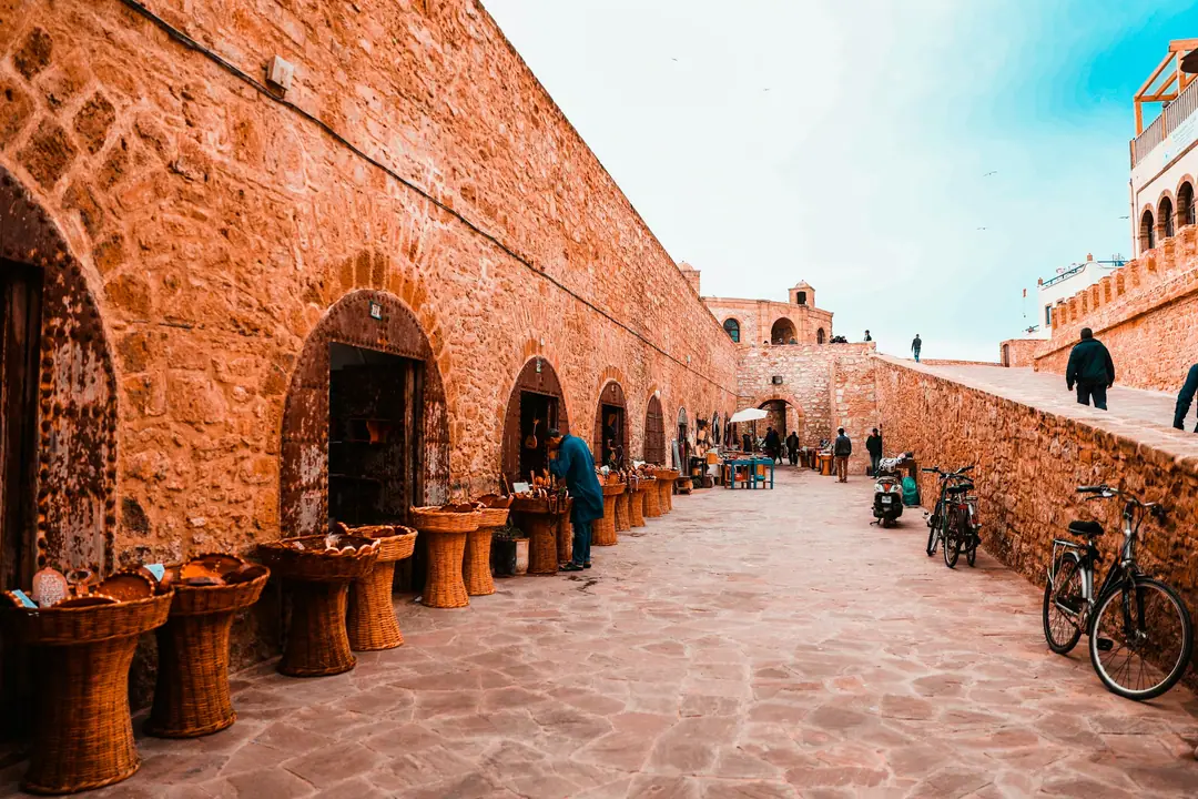 Craft shops under the arches along the ramparts of Essaouira medina